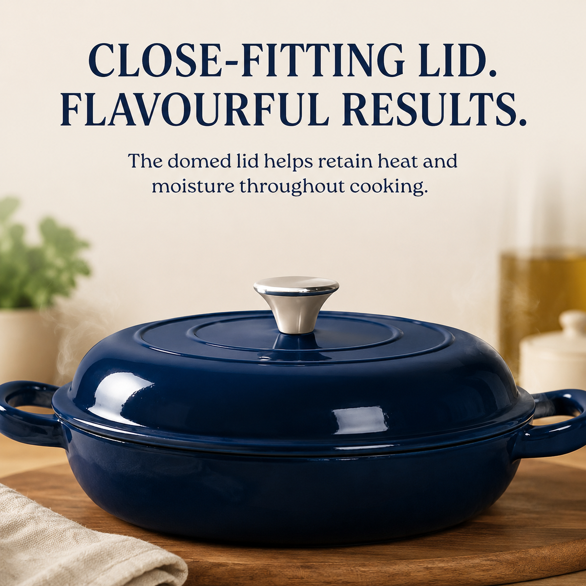 A navy blue enameled cast iron casserole dish with a matching lid and silver-toned knob, shown on a wooden surface with promotional text above.